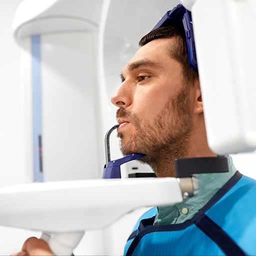 Man receiving C T cone beam digital x-ray scans