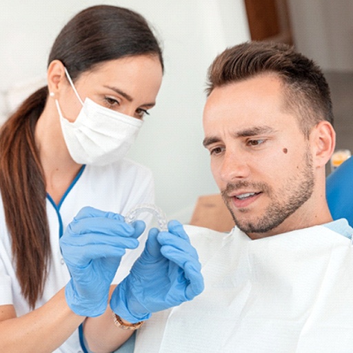 Man at dentist in Winfield getting Invisalign