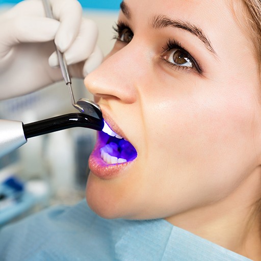 Patient receiving cosmetic dental bonding