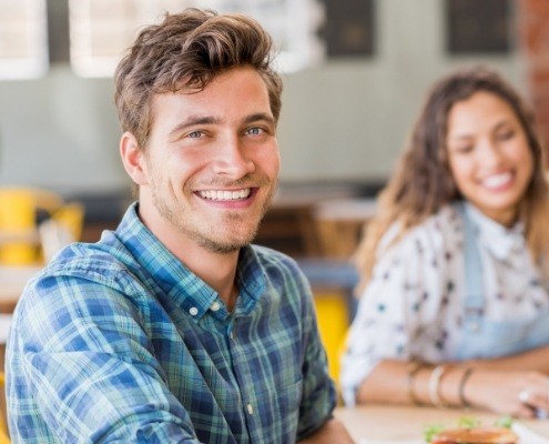 Man with healthy smile after gum disease treatment