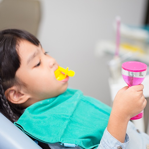 Patient receiving fluoride treatment