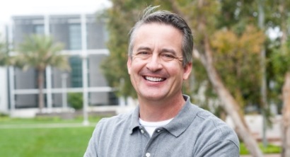 Man with flawless smile after replacing missing teeth