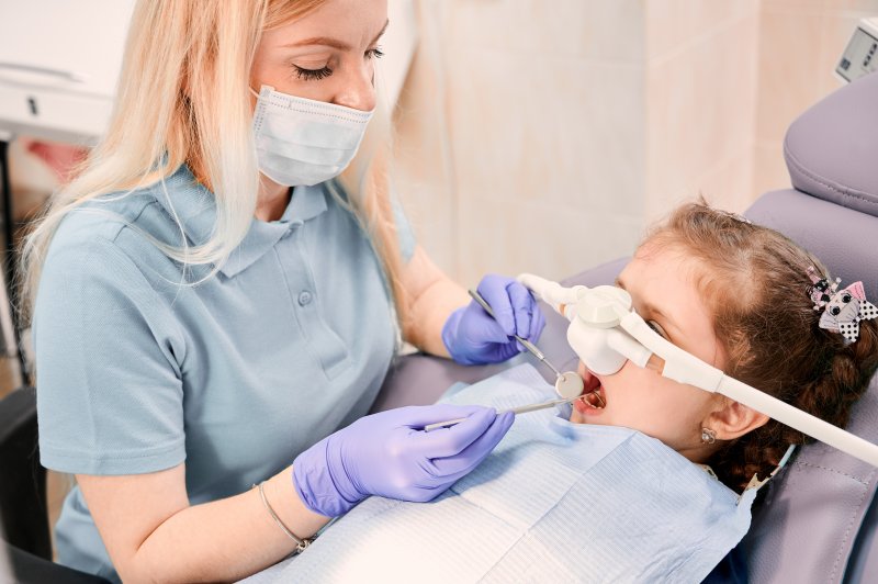 child getting dental work done with help of sedation dentistry