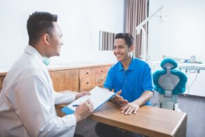 dentist and patient talking during a consultation